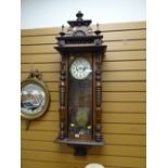 A large ornate Vienna wall clock