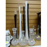 Collection of various colour lily vases & decanters