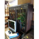 A vintage oak mahogany astragal glazed raised bookcase