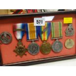 A display case of WWI medals & badges of James Cutler, First Surrey Yeomanry (Trooper then Lt no.
