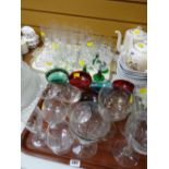 Two trays of various drinking glasses including vintage coloured glass, champagne bowls, hock