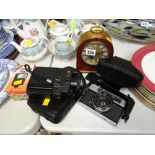 Vintage Rival camera together with a Canon camcorder, brass effect & decorated mantel clock