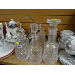 Collection of cut glass decanters, glass birds