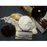 Four various coloured fur hats, a Saga mink stole & a seal skin handbag