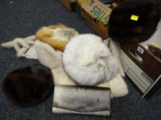 Four various coloured fur hats, a Saga mink stole & a seal skin handbag