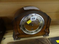 A vintage oak cased dome topped Westminster Chimes mantel clock
