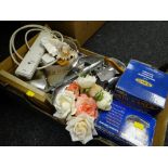 Box of various household items including shoe stretchers, torch, Polaroid instant camera etc