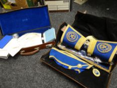 Two brown leather cases containing Masonic regalia