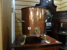 A copper & brass handled & footed planter
