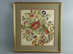 AN ATTRACTIVE WOOLWORK PANEL of mixed flowers, 37.5 x 34 cms