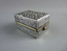 AN UNUSUAL SILVER CASED LIDDED BOX with interior two part fold-out stand, the exterior having all