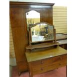 AN EDWARDIAN INLAID MAHOGANY THREE PIECE BEDROOM SUITE of single mirrored door wardrobe with lower