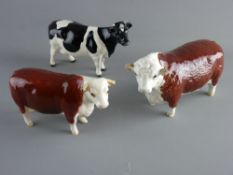THREE BESWICK POTTERY CATTLE to include a Friesian 'Champion Claybury Leegwater', 'Champion of