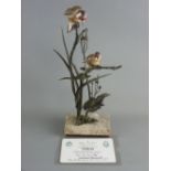 AN ALBANY FINE CHINA GOLDFINCH, bronze and porcelain study of two birds perched on branches and