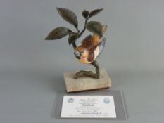 AN ALBANY FINE CHINA HAWFINCH, bronze and porcelain study from the European Finch Series, on a