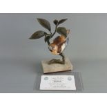 AN ALBANY FINE CHINA HAWFINCH, bronze and porcelain study from the European Finch Series, on a