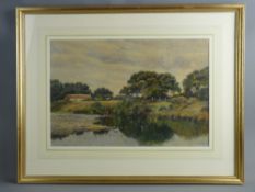 Watercolour - riverscape with woodland and farm to the background, unsigned, 35 x 52 cms