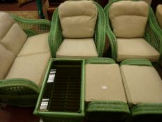 A SIX PIECE GREEN WICKER CONSERVATORY SUITE comprising two seater settee, twin armchairs with
