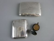 TWO SILVER CIGARETTE CASES and a base metal sovereign case, both cases with engine turned