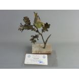AN ALBANY FINE CHINA GREENFINCH, bronze and porcelain study, on a rectangular marble base, limited