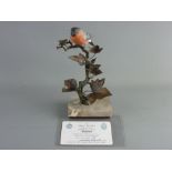 AN ALBANY FINE CHINA BULLFINCH bronze and porcelain study from the European Finch Series, on a