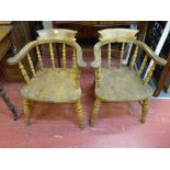 A PAIR OF VINTAGE SMOKER'S BOW ARMCHAIRS, 71 cms high, 61 cms wide, having turned spindlebacks,