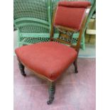 AN EDWARDIAN INLAID ROSEWOOD SALON CHAIR with upholstered back and seat, pierced central splat