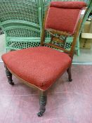 AN EDWARDIAN INLAID ROSEWOOD SALON CHAIR with upholstered back and seat, pierced central splat