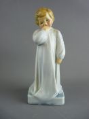 A RARE DOULTON & CO 'DARLING' FIGURINE HN1, designed by Charles Vyse, circa 1913 depicting a young