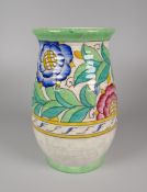 A CROWN DUCAL BY CHARLOTTE RHEAD VASE with green, blue & yellow floral design, 17cms high
