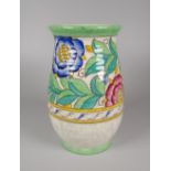 A CROWN DUCAL BY CHARLOTTE RHEAD VASE with green, blue & yellow floral design, 17cms high