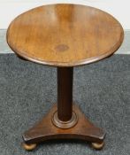 NINETEENTH CENTURY MAHOGANY CIRCULAR TOP TRIPOD TABLE raised over bun feet, 52cms diam