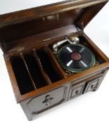 A 1920s SELECTA WIND-UP GRAMOPHONE in carved oak cabinet, Reg No. 221718, 71cms wide (BBC Bargain H