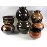 SEVEN VARIOUS STUDIO POTTERY VESSELS each of similar glaze decoration and with similar potter's