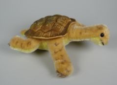 A STEIFF SOFT-TOY TORTOISE with plastic shell and glass eyes, stud marked Steiff