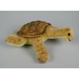 A STEIFF SOFT-TOY TORTOISE with plastic shell and glass eyes, stud marked Steiff