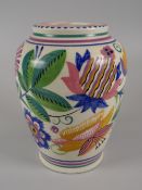 A POOLE POTTERY by Truda Carter and decorated by Gladys Hallett with bright exotic flowers and