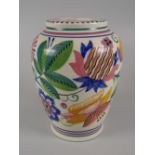 A POOLE POTTERY by Truda Carter and decorated by Gladys Hallett with bright exotic flowers and