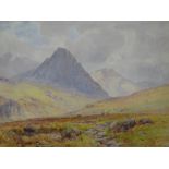 CLINTON JONES watercolour - view of Tryfan, Snowdonia with cattle and brook, signed, 24 x 33cms