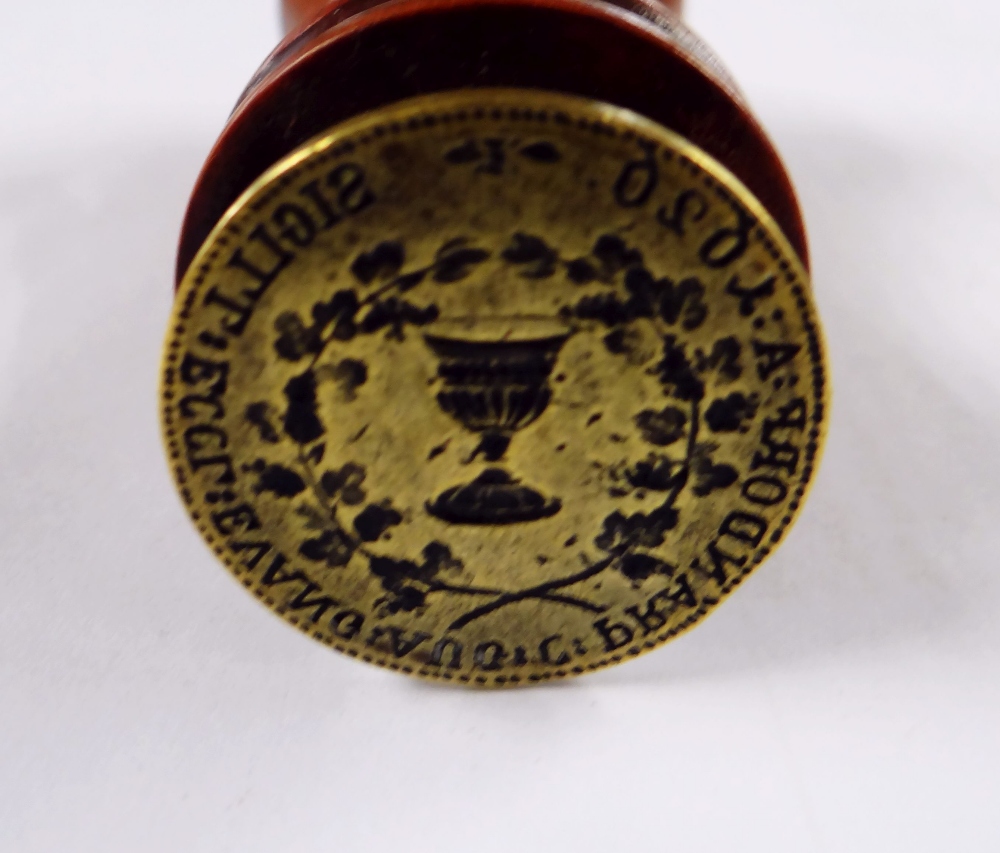 A 17TH CENTURY BOHEMIAN BRASS DESK-SEAL for the crossing of wine over Eastern European borders, - Image 2 of 2