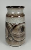 A POOLE POTTERY VASE of slightly tapering form with inverted neck and having a mottled glaze and