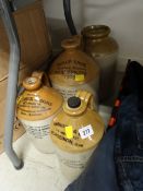 Three vintage stone glazed bottles & storage jar by Pick Up Brothers, Pontypridd, Harrison & Co,
