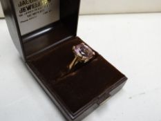 A 9ct smoky amethyst stone ring