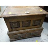 A nineteenth century oak coffer bach with two base drawers (distressed for restoration)