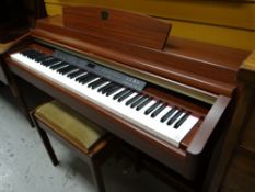 A good modern Yamaha Clavinova piano organ with stool