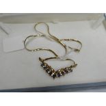 A 9ct sapphire & diamond necklace