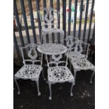 White painted metal circular garden table & five matching chairs (outside)
