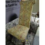 A floral upholstered prie dieu chair