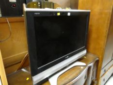 A Sharp Aquos flat screen TV E/T