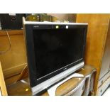 A Sharp Aquos flat screen TV E/T